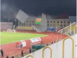 Корреспонденты «Первого канала «Евразия» нашли парней, которые бросились спасать флаг под рухнувшей кровлей стадиона
