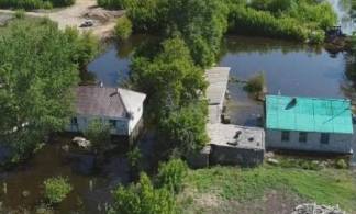 Из-за плановых попусков с Шульбинского водохранилища поселок Аксу снова затопило