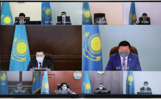 Казахстанскому Правительству сегодня подарили слуховой аппарат, очки и валидол