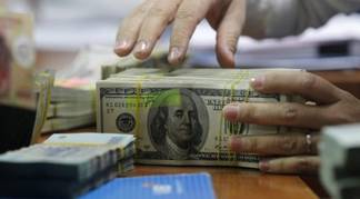 Глава Нацбанка РК успокоил казахстанцев по поводу долларовых депозитов